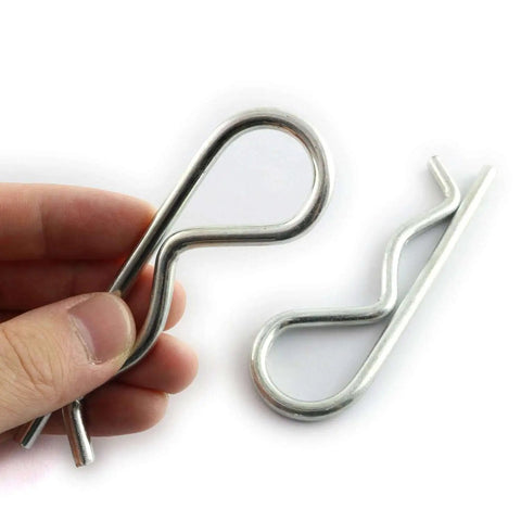Close-up of 2 Pack Stainless Steel R Clips Hairpin Cotter Pins For Quick Securement M5x100 Zinc Coated, held in hand, silver finish visible.
