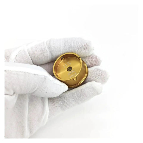 Gloved hand holding watch movement holder tool for NH35 7750 3135 repair, gold precision aluminum alloy piece, metal base fitting stand