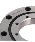 Close-up of a steel crossed roller bearing for slewing and robot joints, compatible with RU28 and XRU1008UUCC0P5, showing multiple holes.