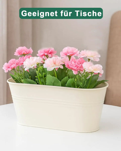 Cool Oval Metal Railing Planters For Outdoor Plants in cream white finish on a table with pink flowers, suitable for tables.
