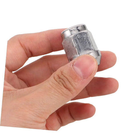 Person holding heavy duty ATV flange nut for secure wheel attachment and go kart compatibility rugged wheel fasteners for outdoor racing