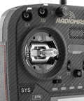 Close-up of Boxer Max ExpressLRS Transmitter with CNC aluminum AG01 Hall gimbals and carbon fiber build.