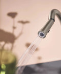 Top Shelf Pulldown Kitchen Faucet In Slick Spot Resist Stainless Steel with 360 swivel spray wand in action