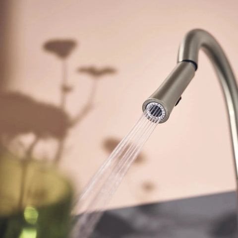 Top Shelf Pulldown Kitchen Faucet In Slick Spot Resist Stainless Steel with 360 swivel spray wand in action