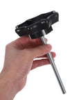 Hand holding Universal Fit Spare Tire Clamp Bolt For Secure Mounting And No Fuss Installation Durable Hold Down Fastener
