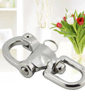 Heavy Hitter 316 Stainless Steel Swivel Snap Shackle With Large Bail And Quick Release Eye Hook For Marine Rigging Boat Yard And Outdoor Job Sites close-up image.
