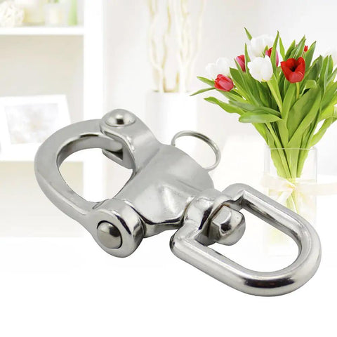 Heavy Hitter 316 Stainless Steel Swivel Snap Shackle With Large Bail And Quick Release Eye Hook For Marine Rigging Boat Yard And Outdoor Job Sites close-up image.