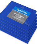 Top Shelf Sticky Floor Mats At 24 By 36 Inches With Five Packs, blue sticky mats stacked for dust control, peel sheets visible.