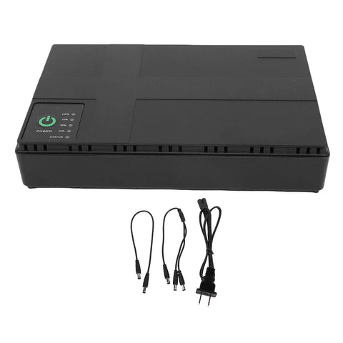 Dont Stress Over Power Outages With This Compact Mini Ups Backup Power Supply Packing 8800mah Capacity And 18w Output To Keep Routers Modems And Security Cameras Running Smoothly, showing black UPS unit with power indicator and cables.