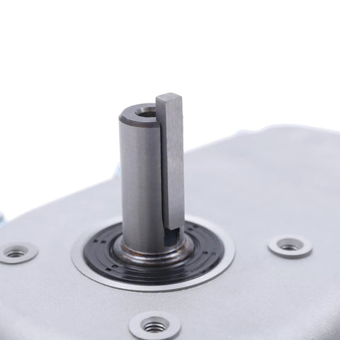 Lumicasaler gear reduction box shaft assembly; metal finish with bearing housing and rectangular locking lug.