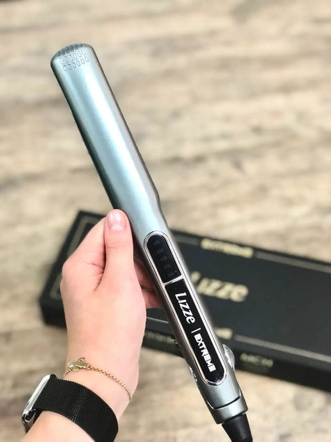 Hand holding Extreme Nano Titanium Hair Straightener With Floating Plates, fast heating, 250C, 110 Volt, salon quality