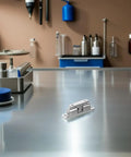 Stainless Steel Boat Door Catch Set For Marine Yacht Cabin Hardware With Smooth Polished Finish And Easy Install Tension Latch on a work surface.