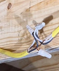 Open Splice Junction Box Single UL Listed Easy Five Second Installation Splice Box For Electrical Wiring 25.8 Cu In Capacity Four Sided Wiring Access USA Made Fire Resistant Polymer JB400 installed in wooden ceiling with wiring connections visible