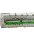 Industrial PLC Controller 2080-LC20-20QWB And 2080-LC2020QWB Dual Model Pack For Rock Solid Automation Control Compact CPLD Color One Color Interface Easy Wiring And Quick Setup Built To Handle Demanding Factory Floor Tasks., side view with green terminal blocks