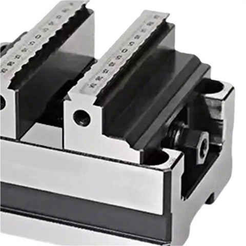 Close-up of self centering jaws on Self Centering Concentric Vise Featuring A Six Axis Rotary Turntable Fixture For Tight Machining Jobs delivering precise alignment.