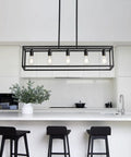 Farmhouse Kitchen Island Light With Black Matte Finish, Modern Industrial Five Light Linear Pendant Fixture in a bright kitchen setting