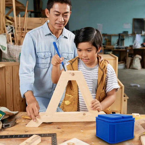 Father and son using Top Shelf Silicone Glue Brush Kit Four Piece Woodworking Applicator Set With Airtight Jar and Fine Chiseled Tapered Bristles.