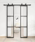 Two Sets Of 18 Inch By 84 Inch Three Paneled Frosted Glass Double Barn Doors With Carbon Steel Frame and Hardware Kit Soft Close Included Easy To Install, shown in a modern living room interior with soft lighting.