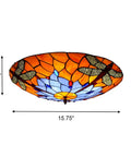Dragonfly 3 Light Flush Mount Ceiling Light With Orange Stained Glass Shade 16 Inch Diameter Glass Fixture side view.