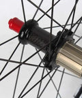 Close-up of Road Bike Wheelset 700C Double Walled Alloy Rims With Carbon Drum Hub V Brake Quick Release Front 100mm Rear 130mm