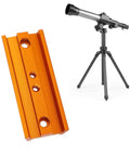 107mm Dovetail Mounting Plate for Telescopes and Cameras with 1/4 inch Thread next to telescope on tripod.