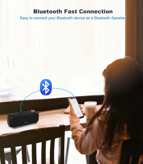 Person connecting phone to Bluetooth Speaker With FM Radio And 5 In 1 Music Player Bluetooth Streaming USB SD Card MP3 AUX
