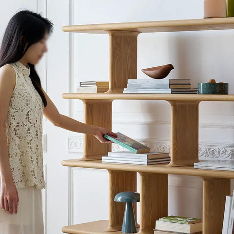 Woman organizing books on Retro Style Floor Standing Book Shelf With Open Multi Layer Shelves For Living Room Or Office