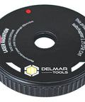 Delmar Tools laser guide disc for miter/portable saw; black plastic with center hole and Delmar Tools logo.