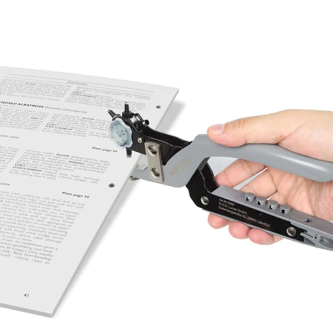 Multi Function Hole Punch Plier Set With Storage Case demonstrating punching holes in paper for crafts and DIY projects