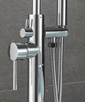 Close-up of floor mounted chrome bath tub faucet for clawfoot tubs with diverter knob and handheld shower hose attachment.