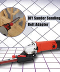 Kick Up Some Dust With This Quick Swap Angle Grinder To Belt Sander Adapter Fits 100 115 And 125 Millimeter Discs With Six Speed Switch Lock One Eighty Pivot And Sure Grip Handle on a grid background.