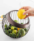 Hand grabbing lemon from wire basket filled with limes, similar to Large Capacity K Cup Pod Holder For Countertop Coffee Bar Accessories