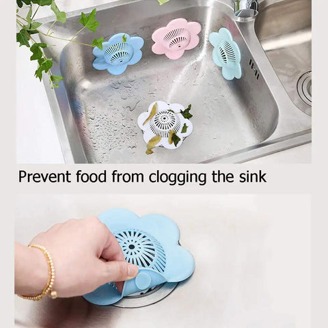 Silicone Hair Catcher Drain Stopper with Suction Cups for Bathroom Shower Bathtub and Kitchen Sinks in sink and picking up.