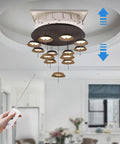 Heavy Duty Chandelier Lifter Hoist Electric 16 Foot 110 Volt Remote Control Raising 220 Lbs Steel Wire Fixture Elevator For Large Lighting in use with remote control.