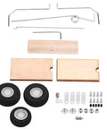 Durable Aircraft Wheel Kit With Lightweight Design And Dope Look For DIY Fixed Wing RC Planes Beginner Friendly Landing Gear With Easy Install And Low Assembly Burden components laying flat, showing wheels, wooden parts, and metal rods.