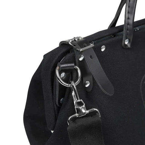 Close-up of Deluxe 16 Inch Canvas Tool Bag With 13 Pockets And Detachable Shoulder Strap showing black leather handle and metal clasp.
