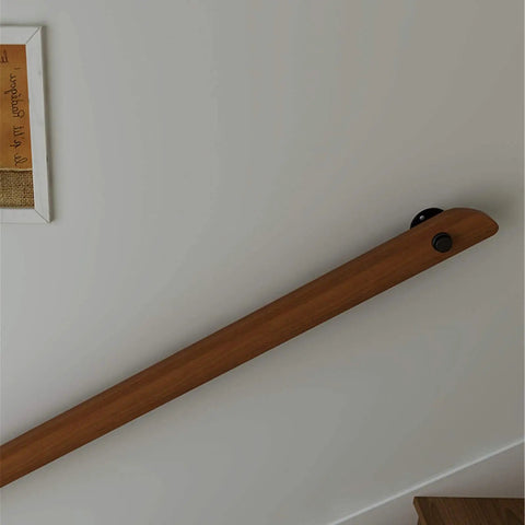 Heavy Duty Wall Mount Stair Railing Handrail Kit For Modern Lofts And Homes Durable Stainless Steel Safety Rail installed above a staircase.