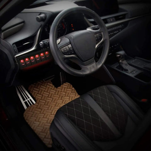 Car interior with 8 Gang Rocker Switch Panel Kit with LED backlit on off switches and overload protection installed on dashboard.