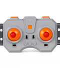 Slick Hopped Up Power Module Kit Compatible With Building Block Models Featuring Six Channel Rechargeable remote control unit with orange buttons.