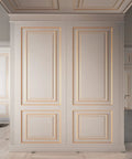Matte Gold Peel And Stick Molding Trim on elegant wall panels in room, showing flexible mirror border for walls, stylish design