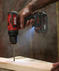 Built Tough Cordless Drill And Impact Driver Combo Kit With Brushless 20 Volt Motors in use drilling into wood.
