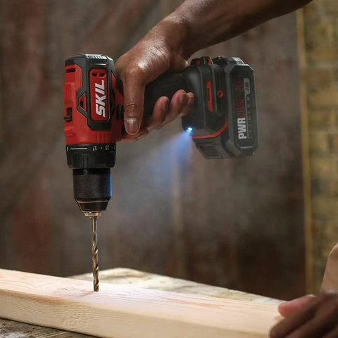 Built Tough Cordless Drill And Impact Driver Combo Kit With Brushless 20 Volt Motors in use drilling into wood.