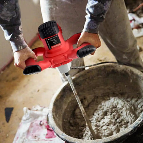 Man using Beast Electric Handheld Cement Mixer 2100W Concrete Paint Drill with 6 Speed Control in a bucket of cement