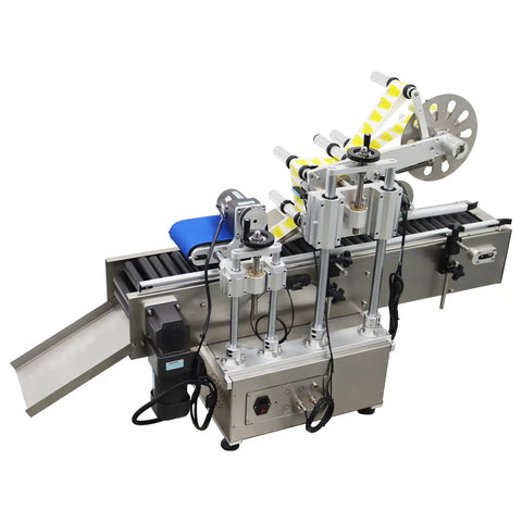 Workhorse Automatic Labeling Machine With Grippy Roller Conveyor For Easy And No Sweat Bottle Wrapping Handling Up To Sixty Labels Per Minute On Reliable 110V Shop Plug Power, top view of machine with rollers.