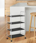 4pcs Inch Swivel Plate Casters for Rolling Chairs and Office Furniture on a 4-tier cart with black shelves and silver frame.