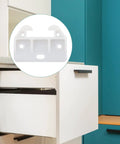Installed white plastic drawer guide in a cabinet, showing 10 Pieces White Plastic Drawer Guides Rear Drawer Replacement Brackets With Screws, Drawer Track Parts For Furniture, Dressers, Wardrobe 59x41x16.5mm Fits.