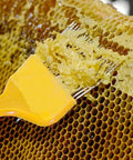 Beekeeping Uncapping Fork With 21 Stainless Steel Tines For Honeycomb Decapping, Pro Grade Bee Tool, Plastic Yellow Handle in use
