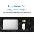 Ultra Smooth Large Gaming Mouse Pad With No Slip Rubber Base Waterproof Edges And Stitched Finish For Gaming Office And Home 31.5 By 11.8 Inches Black Wave, featuring organized desk setup with keyboard, mouse, and office supplies.