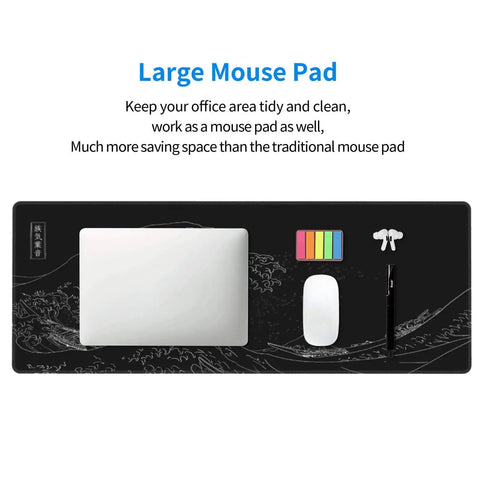 Ultra Smooth Large Gaming Mouse Pad With No Slip Rubber Base Waterproof Edges And Stitched Finish For Gaming Office And Home 31.5 By 11.8 Inches Black Wave, featuring organized desk setup with keyboard, mouse, and office supplies.