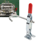Heavy Duty J Hook Toggle Clamp With Galvanized Iron Build And Non Slip Grip For Woodworking Automotive Doors Fixtures, 170 Kg Tension Latch For Rugged Industrial Tasks on a workbench.